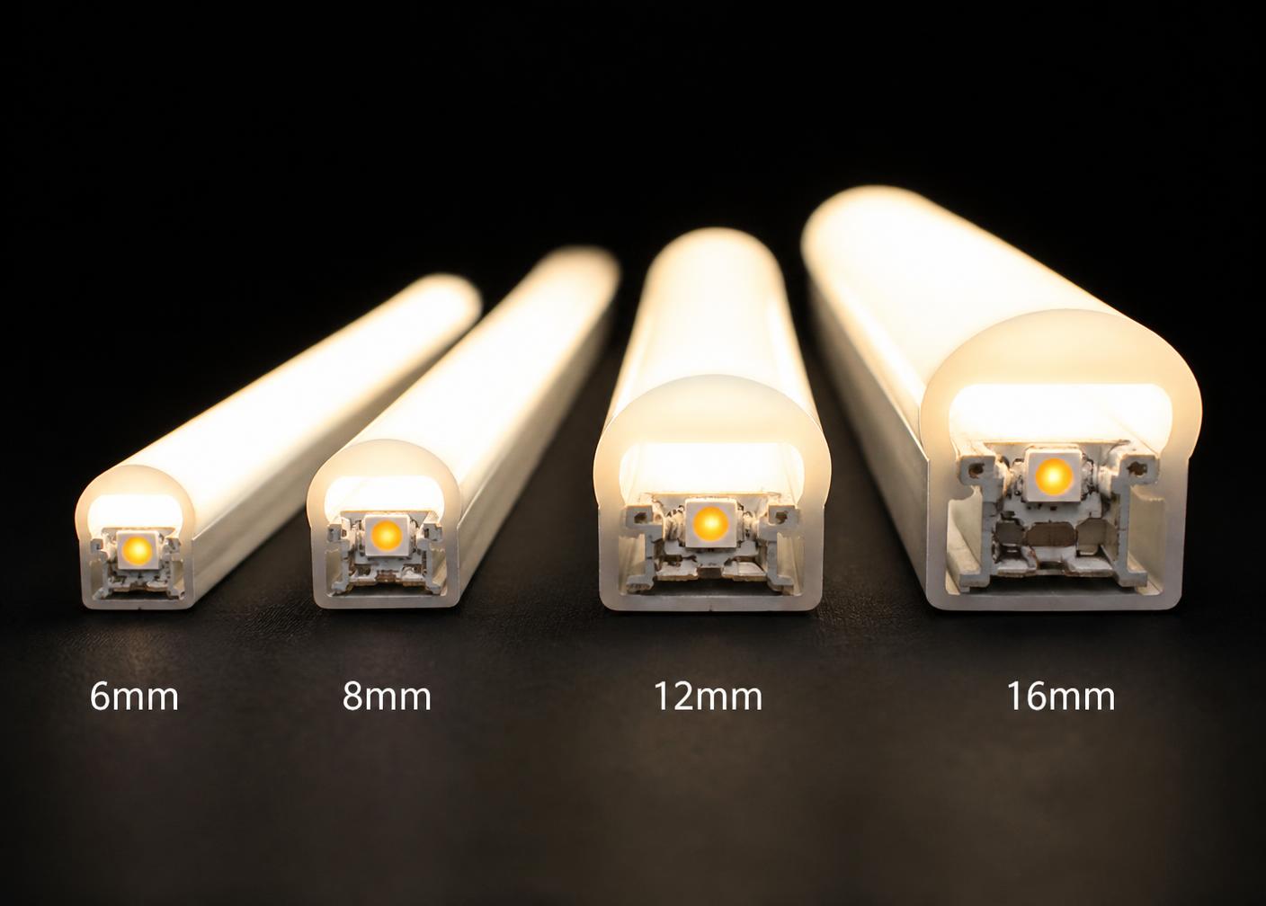 Four LED neon flex profiles in 6mm, 8mm, 12mm and 16mm standing upright and lit warm white